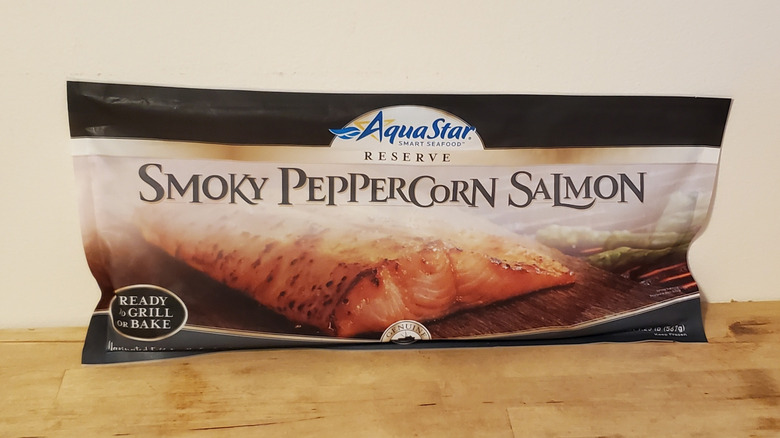 A frozen salmon fillet in an Aquastar package