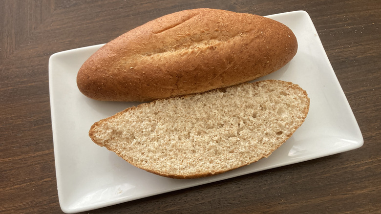 Kroger bolillo roll split down middle on plate