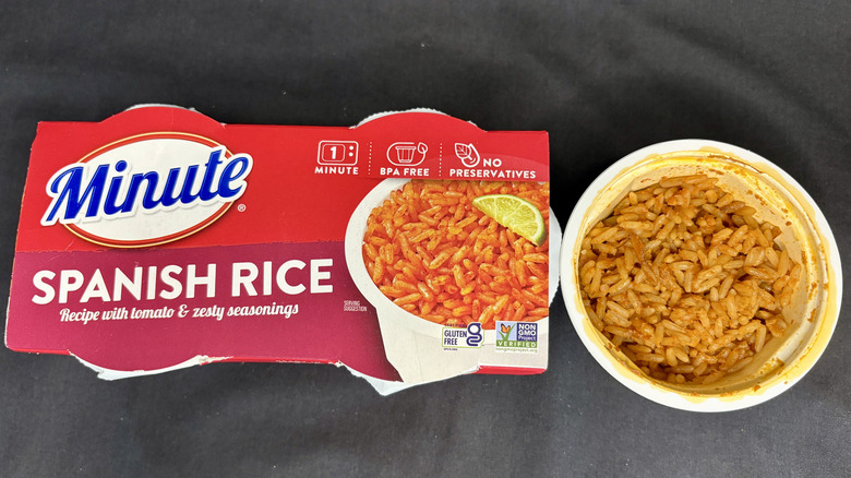 Bowl of rice next to Minute Spanish Rice package