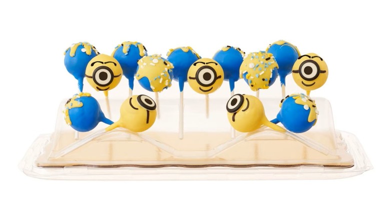 Several cake pops decorated to look like Minions characters.