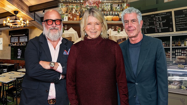 Emeril Lagasse, Martha Stewart and Anthony Bourdain in front of restaurant background