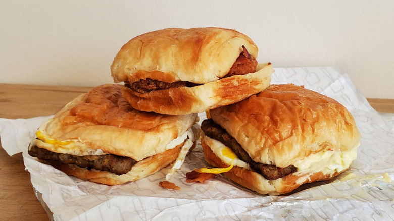 Three Wendy's breakfast sandwiches in a stack