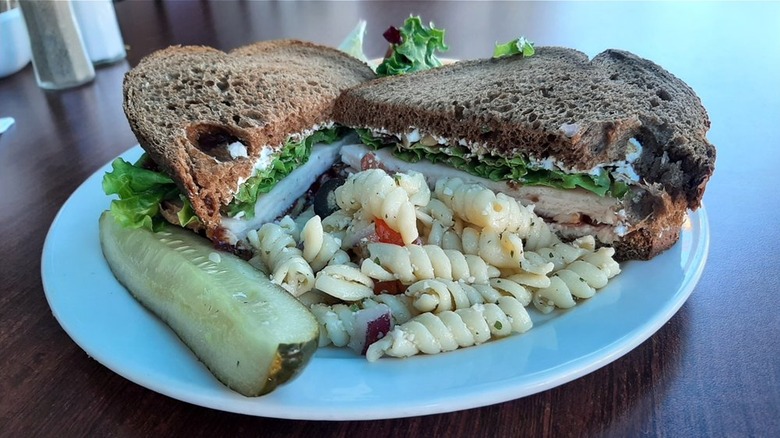 Rutabegorz turkey and cranberry sandwich with pasta salad