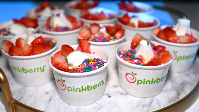 cups of Pinkberry frozen yogurt with strawberries