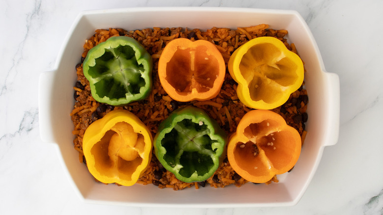 bell peppers in a white baking pan
