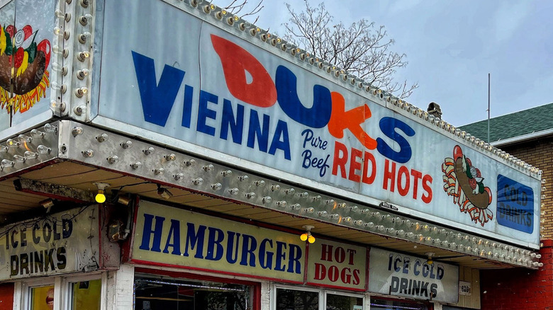 Duk's hot dog stand with red and blue lettering.