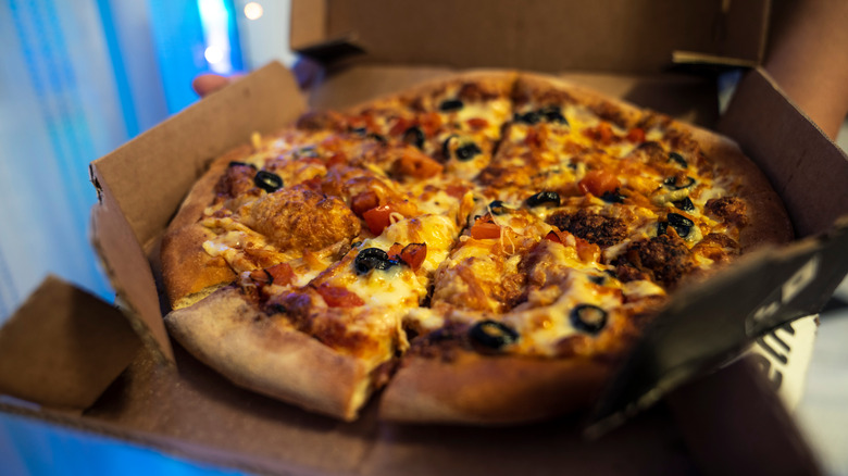 Open box of Domino's pizza