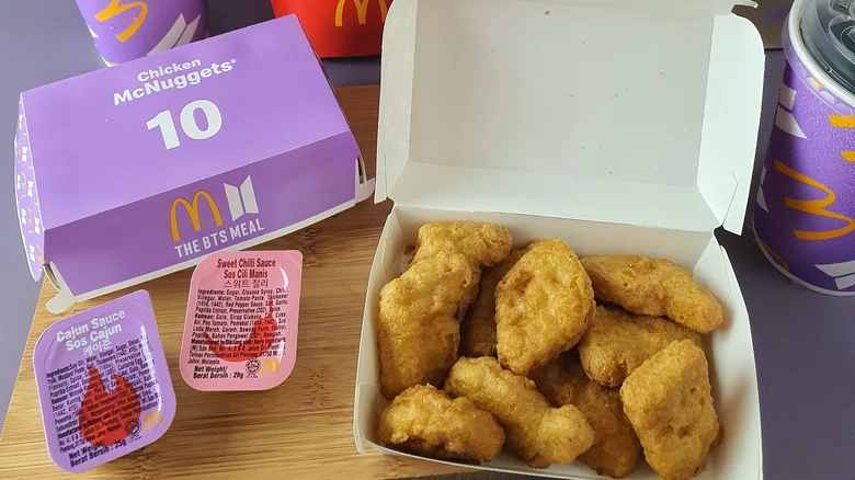 Mcdonalds chicken mcnuggets and dipping sauces from Mashed.com