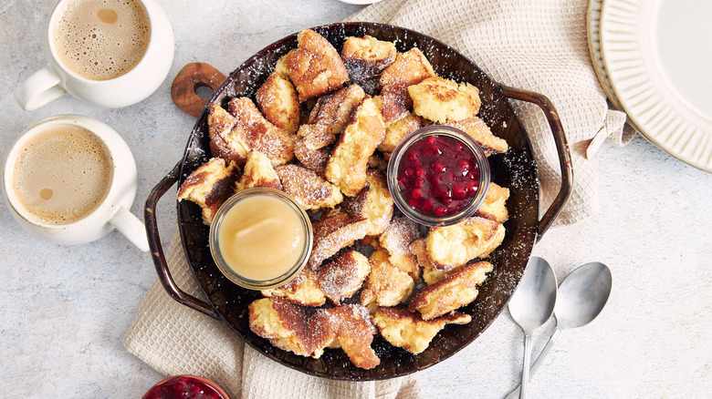kaiserschmarrn in a pan with fruit compote