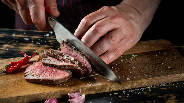 Chef preparing steak