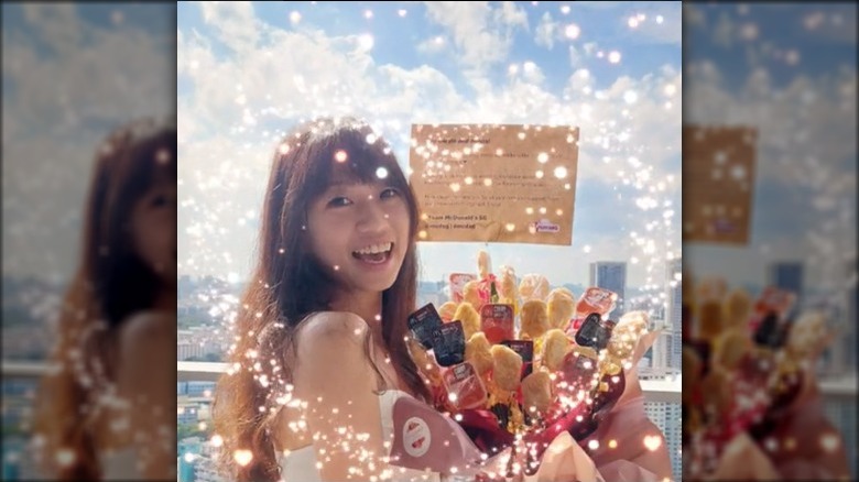 tiktoker agnus with mcdonald's chicken mcnugget bouquet