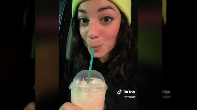 TikToker with Flowers drink