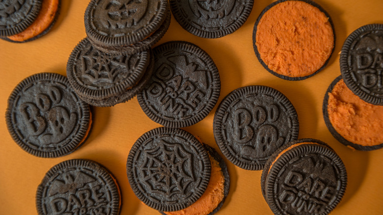 Boo! Oreos on orange background