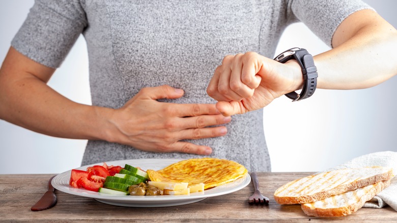 Woman waiting to eat meal