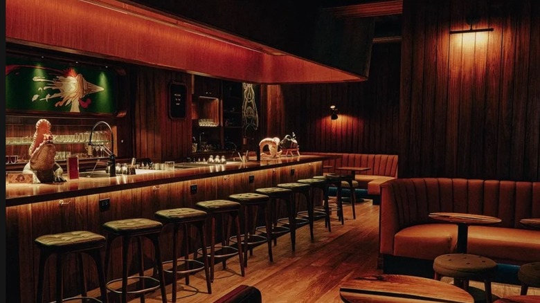 Dimly lit bar with empty seats