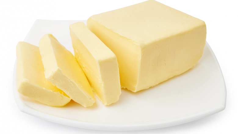 sliced butter on a white plate