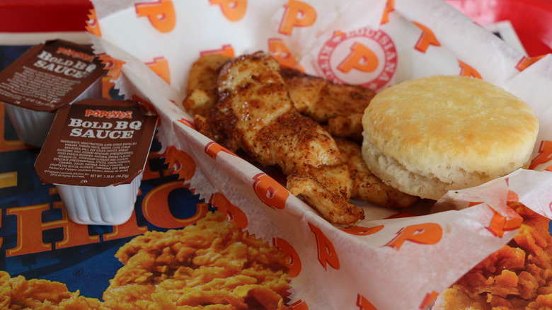 Popeyes chicken tenders and biscuit