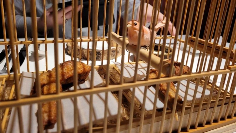 Fried chicken in a bird cage