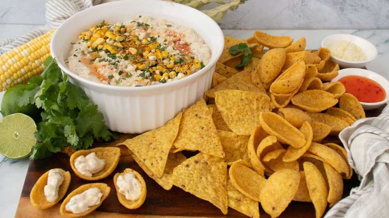Bang bang corn dip served with Fritos and tortilla chips