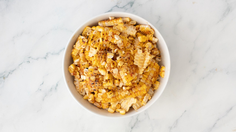 Charred shaven corn kernels in bowl