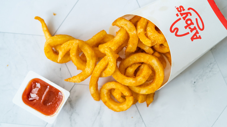 Arby's curly fries with ketchup