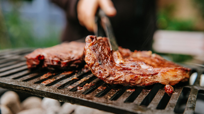 Cooking meat on a grill