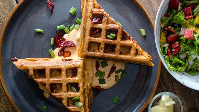 waffle sandwich with cheese leaking out