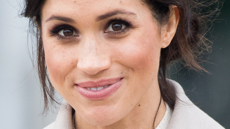 Meghan Markle smiling for photographers 