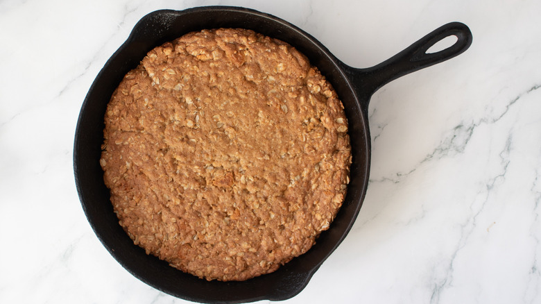 oatmeal cookie in a black frying pan