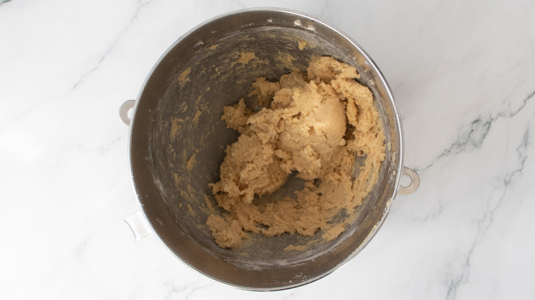 cookie dough in a metal bowl