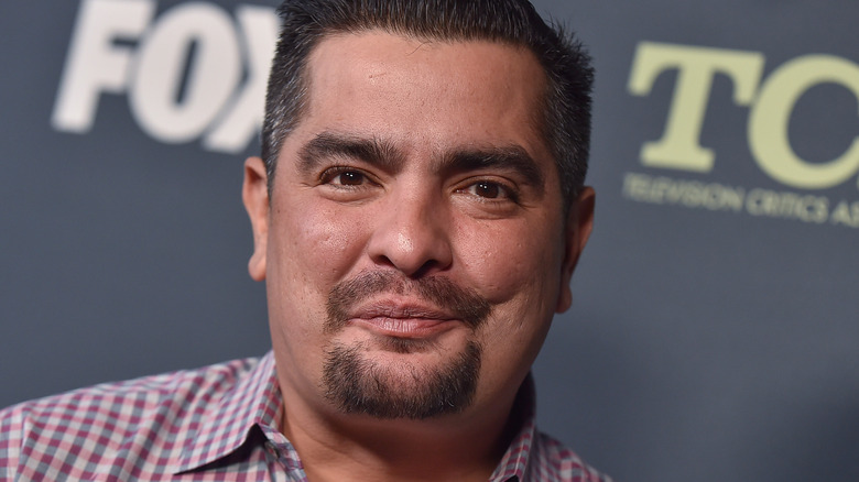 aaron sanchez wearing plaid shirt on red carpet