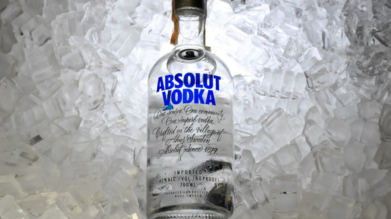 Absolut Vodka bottle on ice