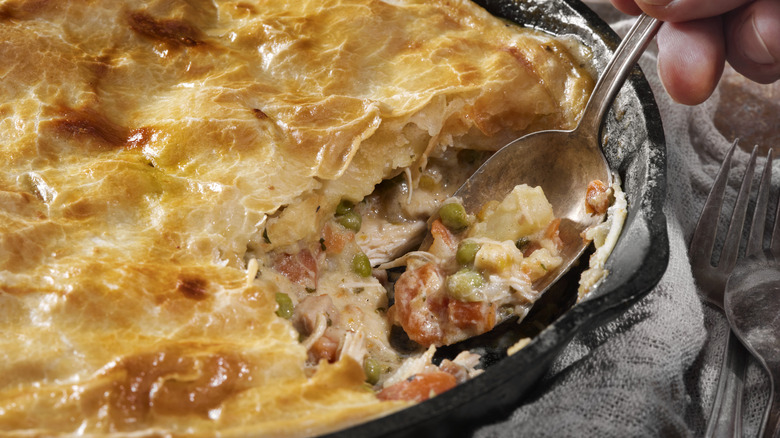 Chicken pot pie with stuff and spoon