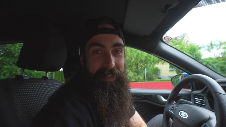 Adam Moran in a car