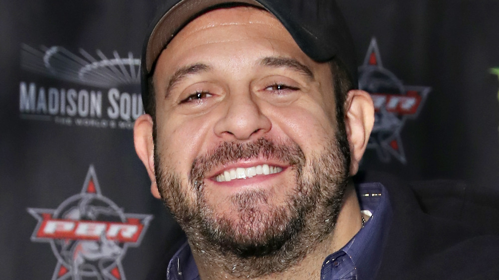 Adam Richman smiling at event