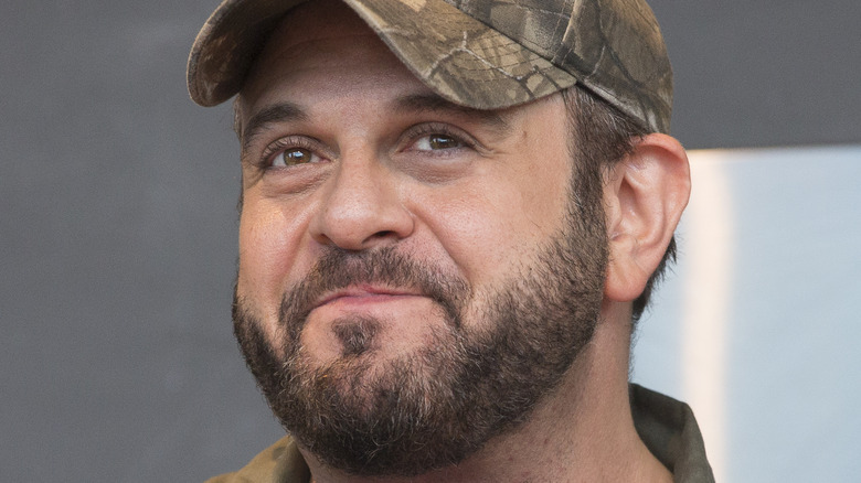 Adam Richman wearing hat