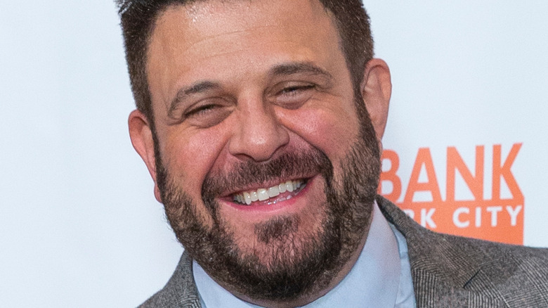 Adam Richman smiling at event