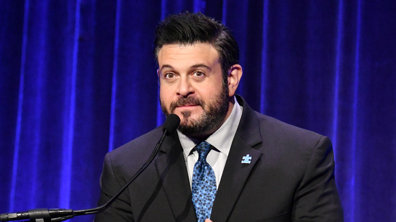 Adam Richman in a suit