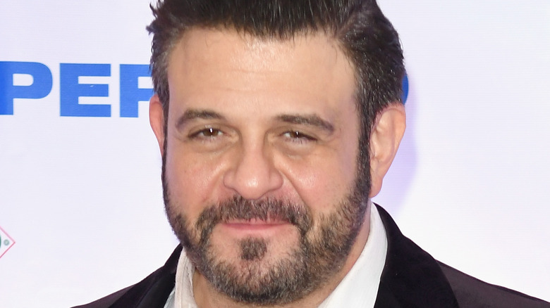 Adam Richman with faint smile