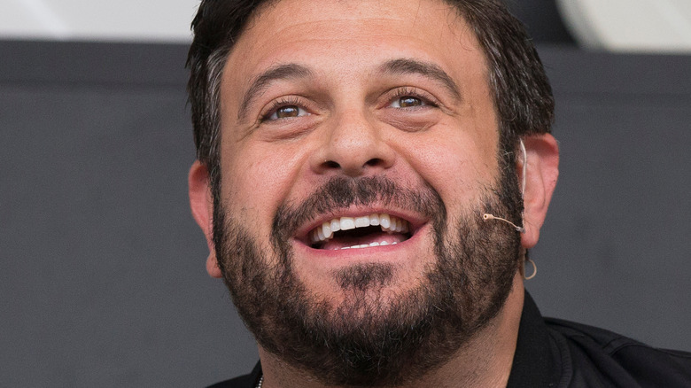 Close up of Man v. Food host Adam Richman