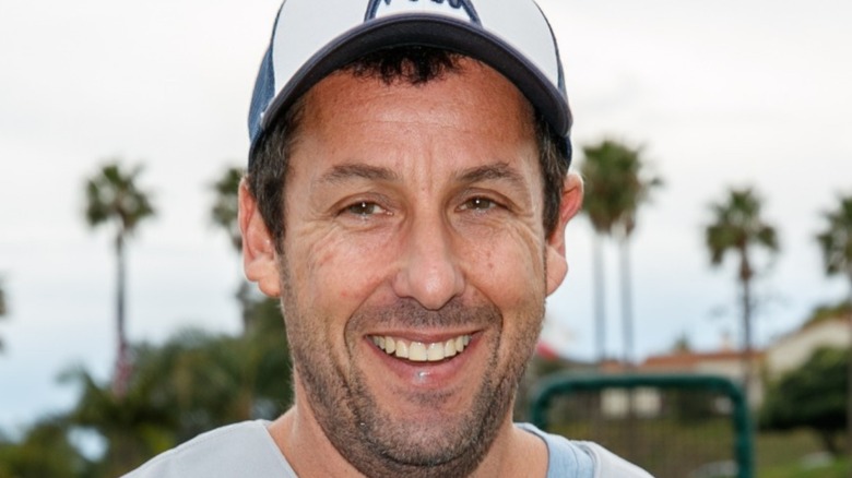 Adam Sandler in baseball cap