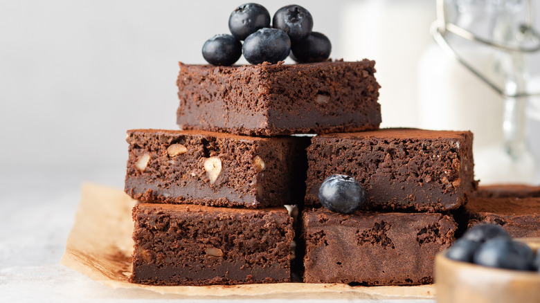 Stack of brownies with blueberries