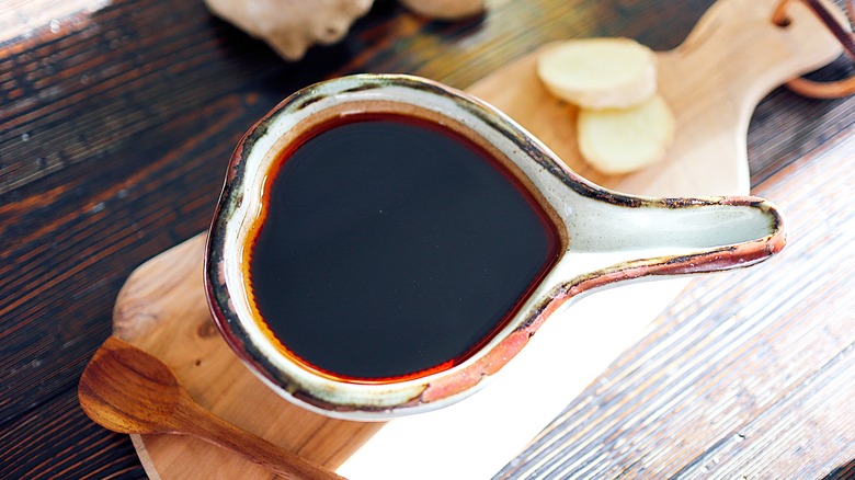 Brown sauce in ceramic container