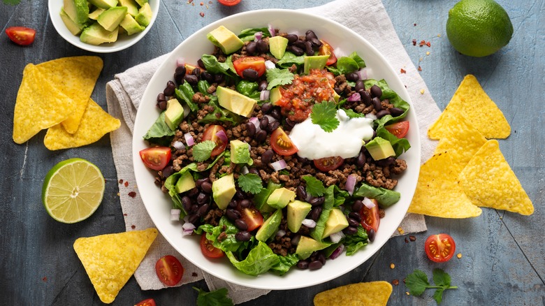 A taco salad bowl with tortilla chips