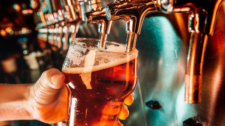 Beer being poured into glass