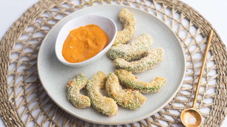 Air fryer avocado fries on a plate