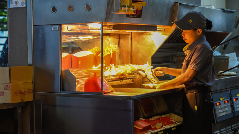 McDonald's employee making french fries