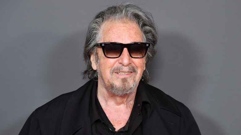 Closeup of Al Pacino in black shirt with sunglasses