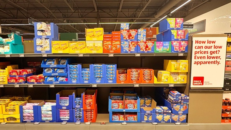 Shelves with a variety of cookies inside an Aldi store.
