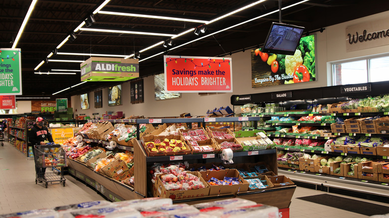 shopper in aldi produce section